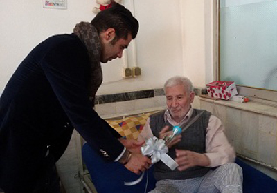دیدار محسن فروزان از آسایشگاه معلولین و سالمندان رشت